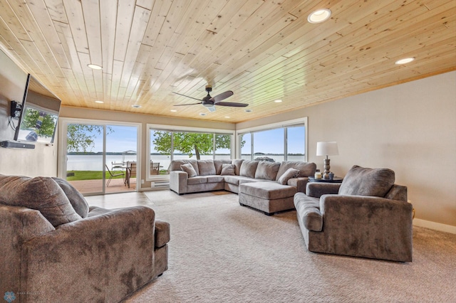 living room with carpet floors, recessed lighting, wooden ceiling, and plenty of natural light