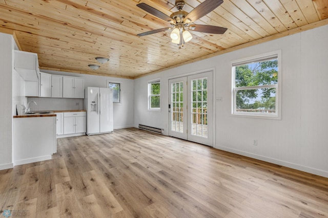 kitchen with light wood-style floors, wood ceiling, white refrigerator with ice dispenser, and a baseboard heating unit