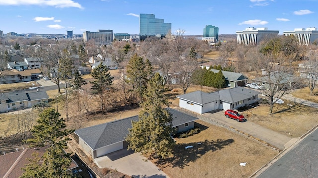 birds eye view of property with a city view