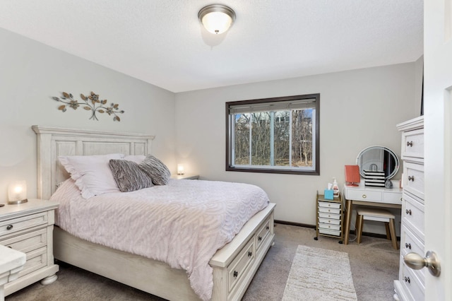 carpeted bedroom featuring baseboards