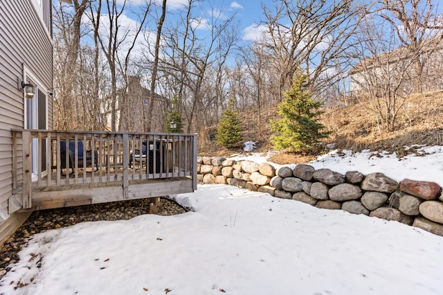 view of snow covered deck