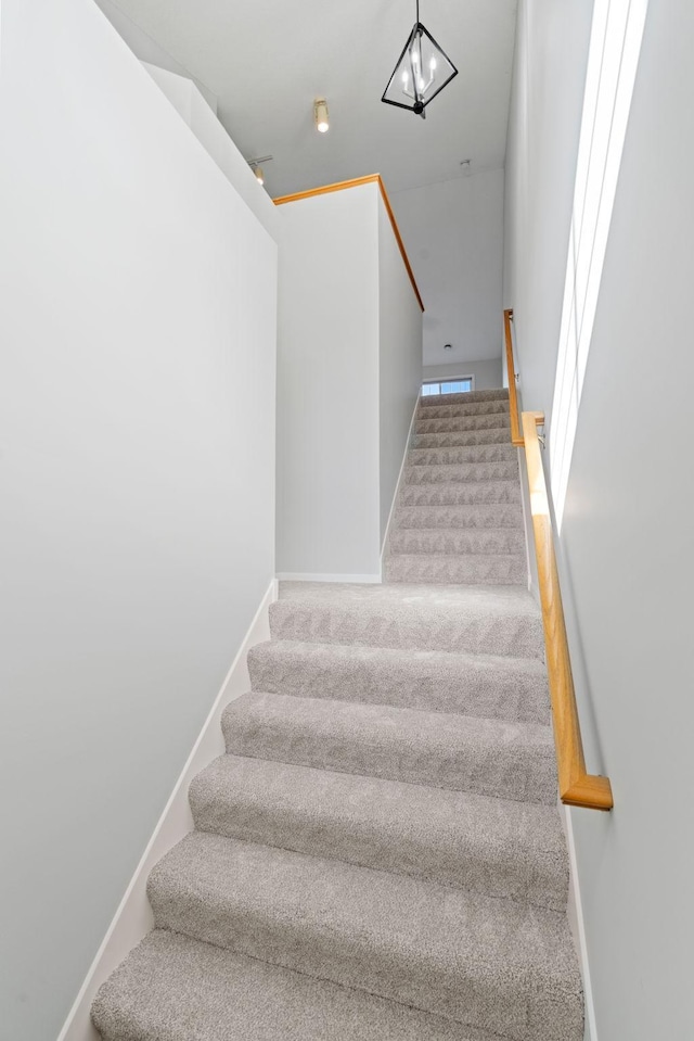 15721 France Way Unit 1312, Apple Valley, MN 55124 - staircase with baseboards, a notable chandelier, and carpet flooring
