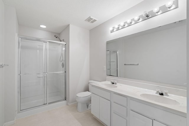 15721 France Way Unit 1312, Apple Valley, MN 55124 - bathroom with a sink, a textured ceiling, and a shower stall