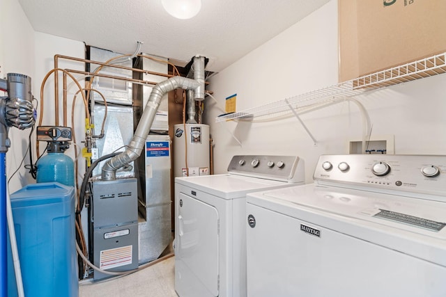 15721 France Way Unit 1312, Apple Valley, MN 55124 - laundry area featuring light floors, gas water heater, laundry area, and washer and clothes dryer