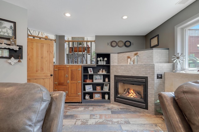 11259 71st Ave N, Maple Grove, MN 55369 - living room with recessed lighting and a brick fireplace