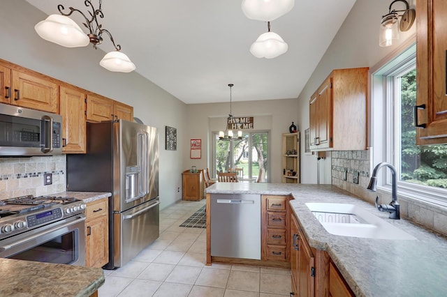 11259 71st Ave N, Maple Grove, MN 55369 - kitchen with stainless steel appliances, a sink, and plenty of natural light