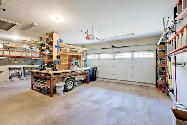 11259 71st Ave N, Maple Grove, MN 55369 - garage featuring a garage door opener and a workshop area