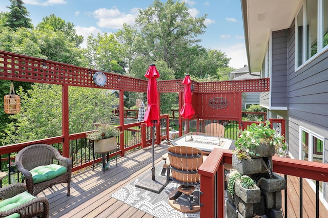 11259 71st Ave N, Maple Grove, MN 55369 - deck featuring a fire pit