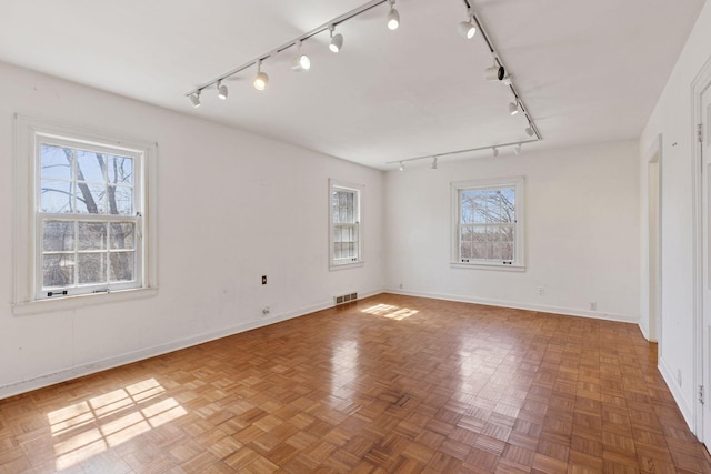 2148 Delaware Ave, Sunfish Lake, MN 55118 - spare room featuring rail lighting and baseboards