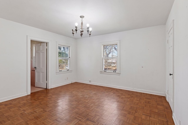 2148 Delaware Ave, Sunfish Lake, MN 55118 - spare room featuring a chandelier and baseboards