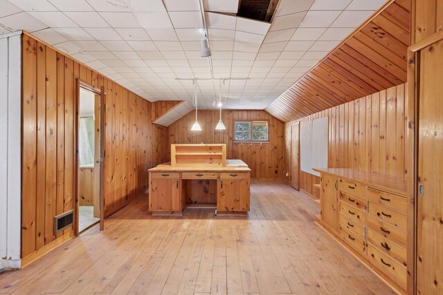 2148 Delaware Ave, Sunfish Lake, MN 55118 - unfurnished office featuring wood walls, light wood-type flooring, and lofted ceiling