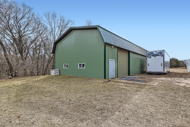 13847 Taconite St NE, Ham Lake, MN 55304 - view of outdoor structure with an outbuilding