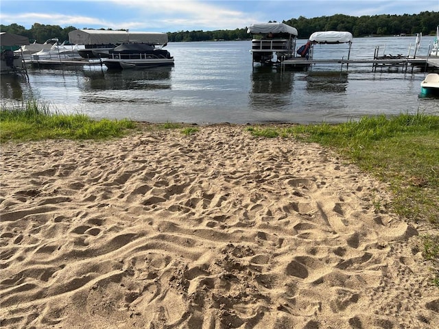 view of dock with a water view and boat lift