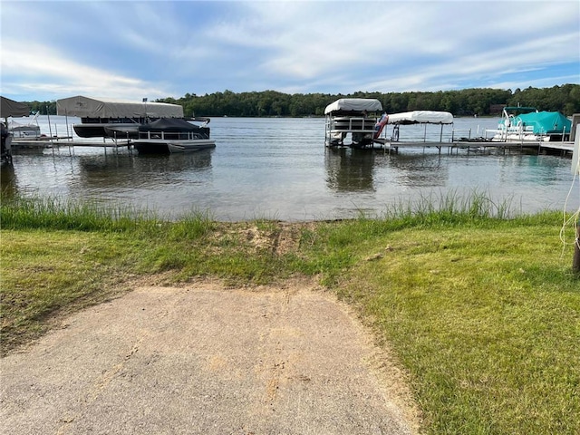 view of dock featuring a water view and boat lift