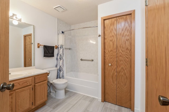 full bath with vanity, shower / tub combo, toilet, and visible vents