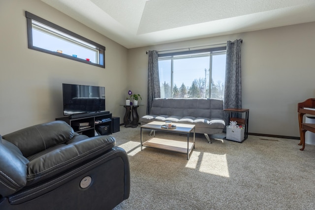 living area with carpet floors and baseboards