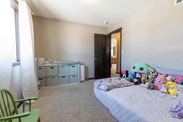 bedroom with carpet flooring and visible vents