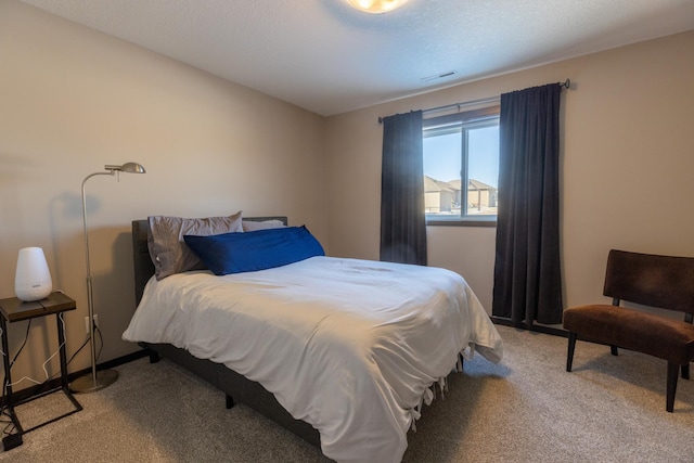 bedroom featuring carpet and visible vents