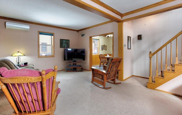 carpeted living room with baseboards, visible vents, stairway, crown molding, and a wall mounted AC