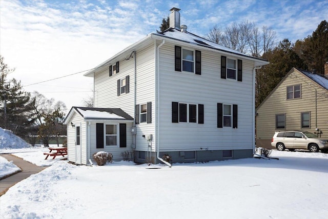 view of snow covered property