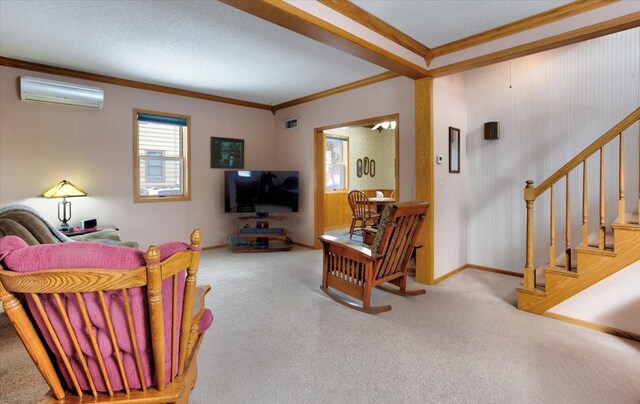 307 Oak St, Glenwood City, WI 54013 - living room with a wall mounted air conditioner, ornamental molding, stairs, carpet flooring, and baseboards