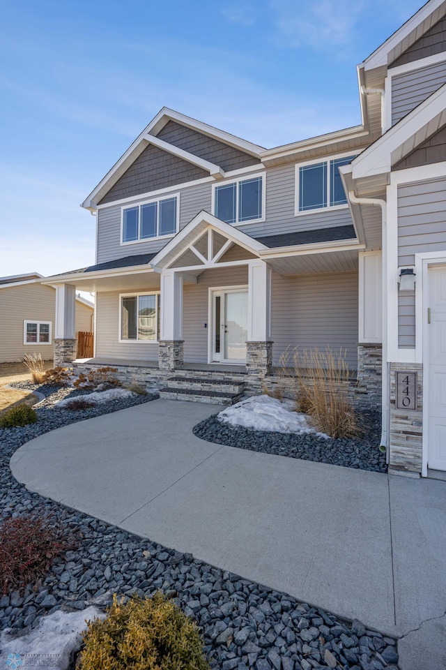 view of front of home with stone siding