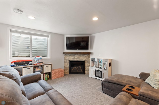 living area featuring carpet, a fireplace, and recessed lighting