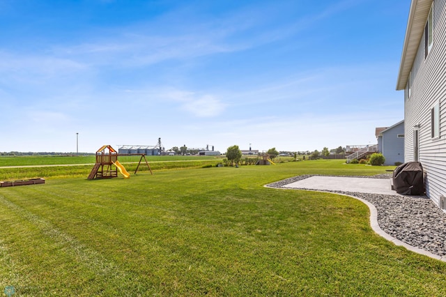 view of yard featuring a playground