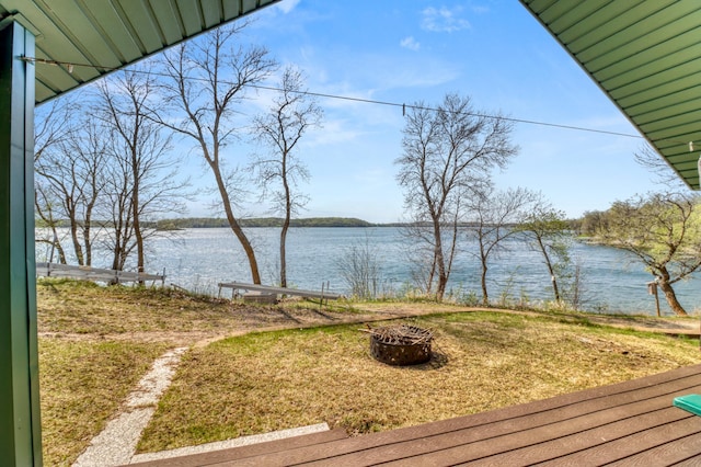 47166 Franklin Ct, Dunn Twp, MN 56572 - wooden terrace with an outdoor fire pit and a water view