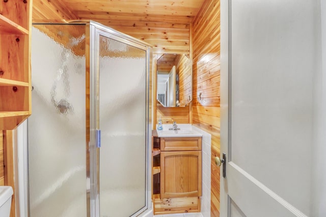 47166 Franklin Ct, Dunn Twp, MN 56572 - bathroom with wood walls, a stall shower, vanity, wooden ceiling, and toilet