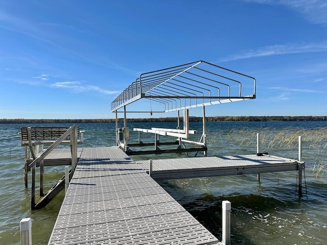 dock area featuring a water view and boat lift