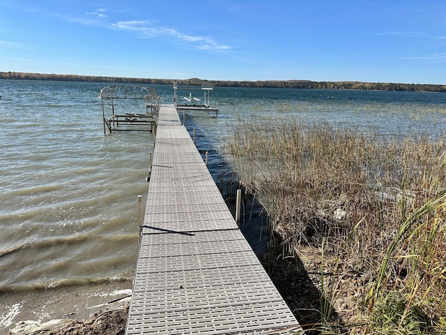 dock area featuring a water view