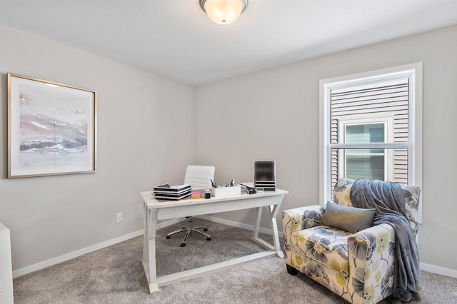 office area with baseboards and carpet floors