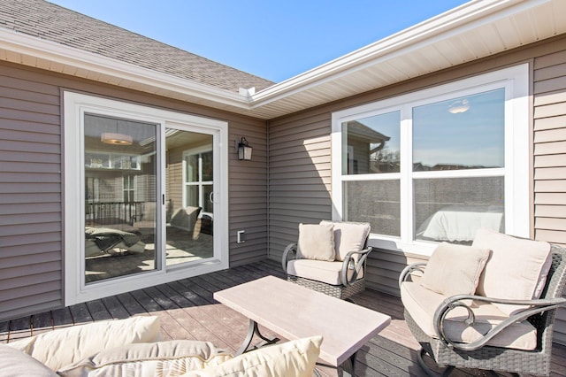 wooden deck featuring an outdoor hangout area