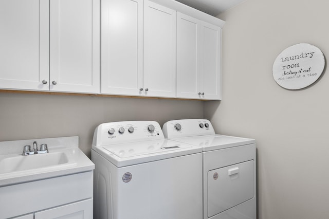 1125 Hewitt Blvd, Red Wing, MN 55066 - laundry room with washing machine and dryer and cabinet space