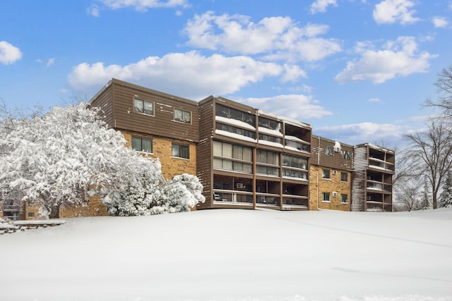 view of snow covered building