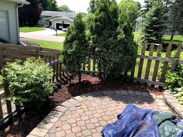 view of patio featuring fence