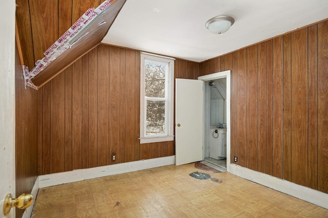 bonus room with wooden walls