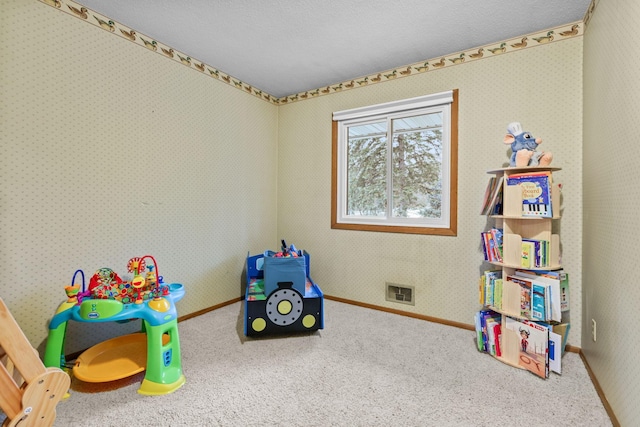 rec room with visible vents, baseboards, carpet, and wallpapered walls