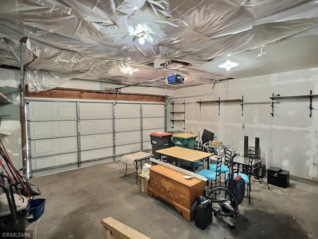 garage featuring a garage door opener