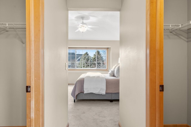 carpeted bedroom with a closet