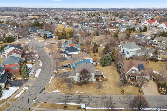 birds eye view of property with a residential view