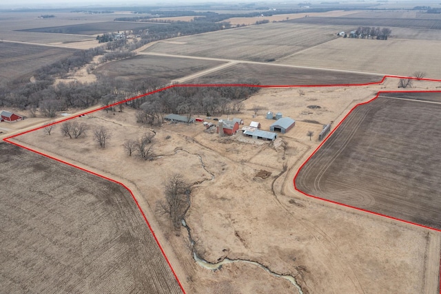 birds eye view of property featuring a rural view