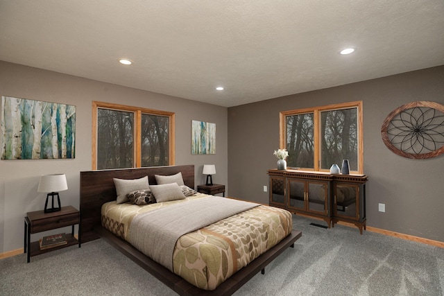 bedroom with carpet, baseboards, and recessed lighting