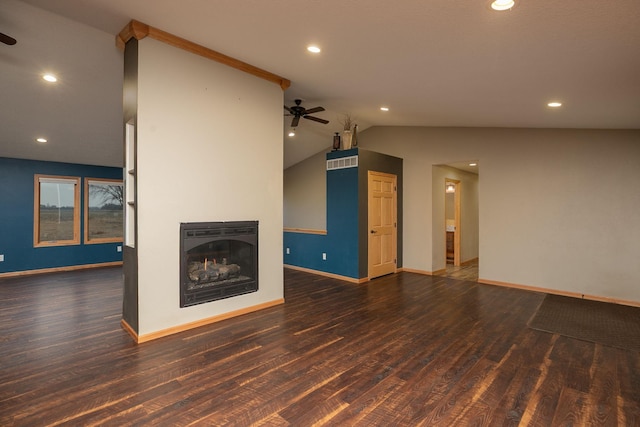 unfurnished living room featuring ceiling fan, a fireplace, and wood finished floors