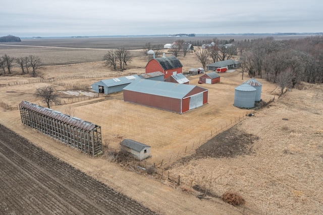 birds eye view of property featuring a rural view