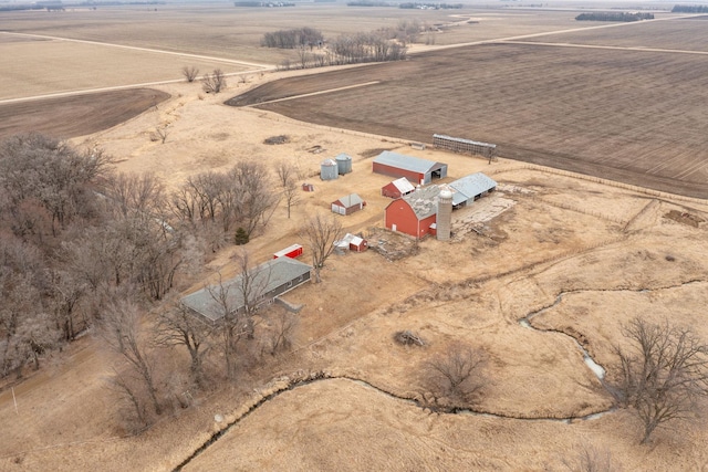 birds eye view of property featuring a rural view