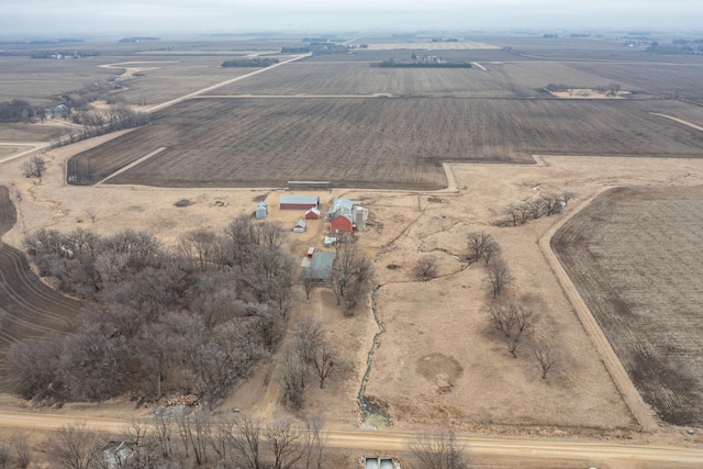 birds eye view of property featuring a rural view