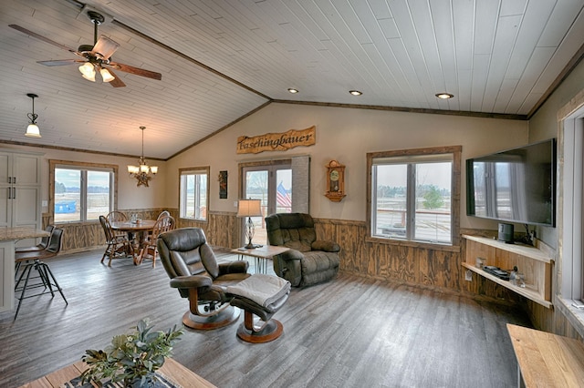 living room with lofted ceiling, wooden ceiling, a wainscoted wall, and wood finished floors