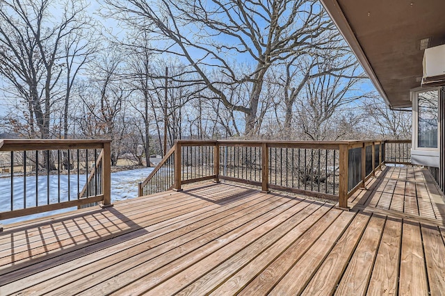 view of snow covered deck